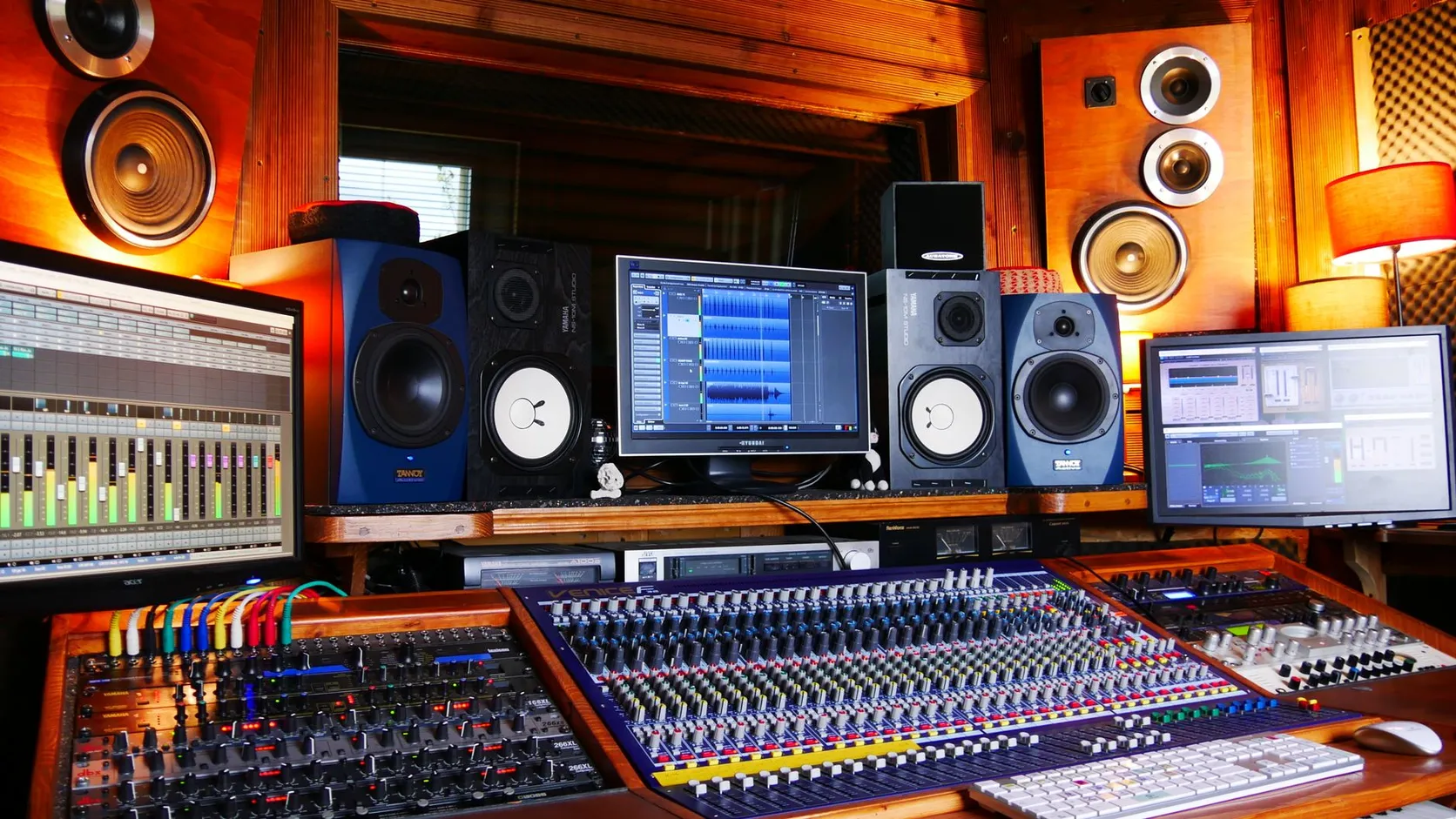 Studio monitor speakers in a recording room